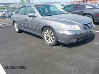 2007 Hyundai Azera SE with VIN KMHFC46F47A149693, listed as a IAAI auction lot 42060439 with 190,317 mi miles and . Bid and sale history available at DreamBid. Image 1.