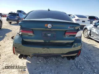 2023 BMW M5 with VIN WBS83CH02PCM33496, listed as a Copart auction lot 85286394 with 0 mi miles and Salvage Title. Bid and sale history available at carsss.com. Image 6.