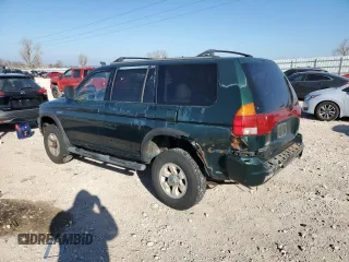 1999 Mitsubishi Montero LS z VIN JA4LS31H5XP033598, wystawiony jako Copart lot #85609464 z przebiegiem 185 686 mil mil oraz Szkoda całkowita • Salvage title. Historia ofert i sprzedaży dostępna na DreamBid. Obrazek 2.