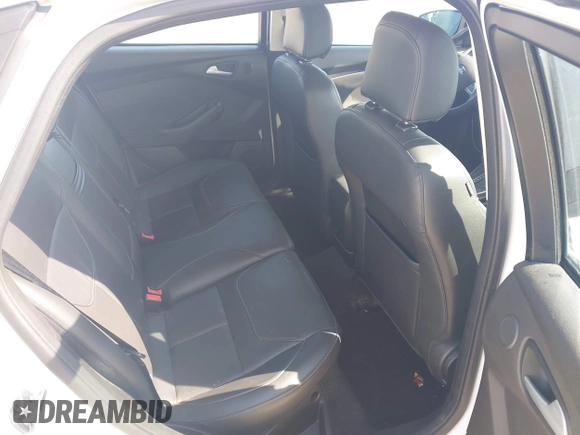 2016 Ford Focus Titanium z VIN 1FADP3J23GL358772, wystawiony jako IAAI lot #42103694 z przebiegiem 85 290 mil mil oraz . Historia ofert i sprzedaży dostępna na DreamBid. Obrazek 8.