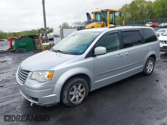 2010 Chrysler Town & Country Touring with VIN 2A4RR5D18AR151604, listed as a IAAI auction lot 42208309 with 207,886 mi miles and . Bid and sale history available at DreamBid. Image 2.