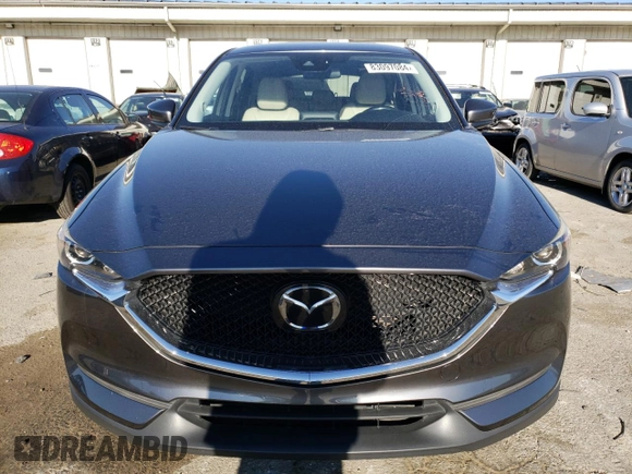 2020 Mazda CX-5 Touring with VIN JM3KFACM7L0846293, listed as a Copart auction lot 83097084 with 68,465 mi miles and Salvage Title. Bid and sale history available at carsss.com. Image 5.