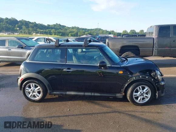 2012 MINI Hardtop with VIN WMWSU3C50CT185690, listed as a IAAI auction lot 42367571 with 63,303 mi miles and . Bid and sale history available at DreamBid. Image 14.
