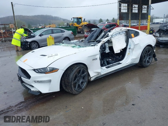 2019 Ford Mustang GT z VIN 1FA6P8CF2K5162910, wystawiony jako IAAI lot #42007989 z przebiegiem 24 399 mil mil oraz . Historia ofert i sprzedaży dostępna na DreamBid. Obrazek 2.
