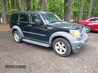 2007 Dodge Nitro SXT z VIN 1D8GU28K97W691929, wystawiony jako IAAI lot #42242093 z przebiegiem 154 136 mil mil oraz . Historia ofert i sprzedaży dostępna na DreamBid. Obrazek 1.