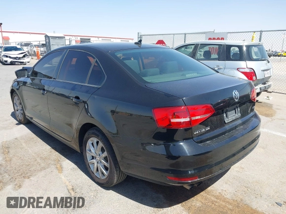 2015 Volkswagen Jetta SE z VIN 3VWD17AJ8FM418758, wystawiony jako IAAI lot #42449833 z przebiegiem 146 618 mil mil oraz . Historia ofert i sprzedaży dostępna na DreamBid. Obrazek 14.