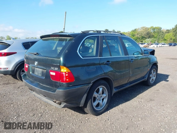 2000 BMW X5 with VIN WBAFB334XYLH02115, listed as a IAAI auction lot 39413915 with 1 mi miles. Bid and sale history available at carsss.com. Image 4.