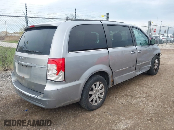 2015 Chrysler Town & Country Touring with VIN 2C4RC1BG0FR706902, listed as a IAAI auction lot 42079036 with 316,041 mi miles. Bid and sale history available at carsss.com. Image 4.