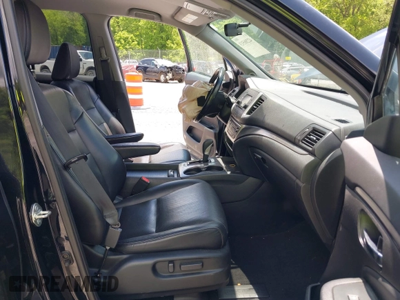 2017 Honda Ridgeline RTL with VIN 5FPYK3F51HB013989, listed as a IAAI auction lot 42206513 with 146,124 mi miles and . Bid and sale history available at DreamBid. Image 5.