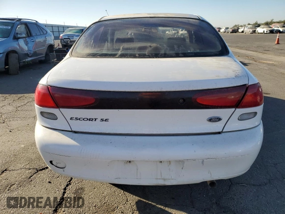 1998 Ford Escort SE z VIN 1FAFP13P0WW139108, wystawiony jako Copart lot #76935594 z przebiegiem 28 413 mil mil oraz Czysty tytuł • Clean title. Historia ofert i sprzedaży dostępna na DreamBid. Obrazek 6.