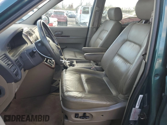2002 Kia Sedona LX with VIN KNDUP131426217512, listed as a Copart auction lot 80928774 with 163,176 mi miles and Salvage Title. Bid and sale history available at carsss.com. Image 7.