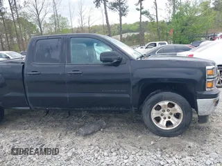 2015 Chevrolet Silverado 1500 LT with VIN 1GCVKREC3FZ170154, listed as a IAAI auction lot 41940479 with 200,965 mi miles. Bid and sale history available at carsss.com. Image 13.