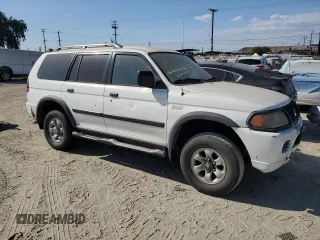 2003 Mitsubishi Montero ES z VIN JA4LS21H03J037761, wystawiony jako Copart lot #70692474 z przebiegiem 181 359 mil mil oraz Szkody całkowita. Historia ofert i sprzedaży dostępna na DreamBid. Obrazek 4.