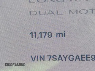 2023 Tesla Model Y Long Range with VIN 7SAYGAEE9PF905943, listed as a IAAI auction lot 41444255 with 11,179 mi miles and . Bid and sale history available at DreamBid. Image 14.