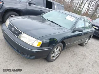 1999 Toyota Avalon XL with VIN 4T1BF18B2XU330305, listed as a IAAI auction lot 41717284 with NaN miles. Bid and sale history available at carsss.com. Image 2.