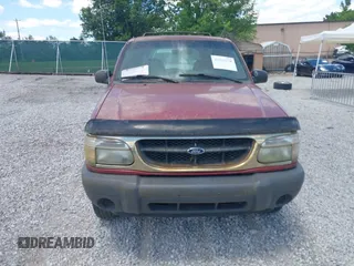 2000 Ford Explorer XLS z VIN 1FMZU72X2YUB64879, wystawiony jako IAAI lot #42333278 z przebiegiem 169 693 mil mil oraz . Historia ofert i sprzedaży dostępna na DreamBid. Obrazek 6.