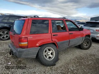 1996 Jeep Grand Cherokee Laredo with VIN 1J4GZ58Y0TC162591, listed as a Copart auction lot 43027025 with 383,318 mi miles and Salvage Title. Bid and sale history available at carsss.com. Image 3.