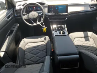 2025 Volkswagen Atlas SE z VIN 1V2KE2CA4SC203130, wystawiony jako Copart lot #54195835 z przebiegiem 20 mil mil oraz Szkoda całkowita • Salvage title. Historia ofert i sprzedaży dostępna na DreamBid. Obrazek 8.