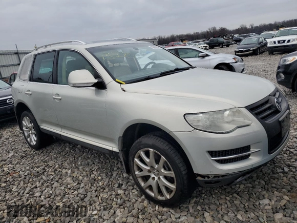 2010 Volkswagen Touareg VR6 with VIN WVGBF7A9XAD002471, listed as a Copart auction lot 83592274 with 202,497 mi miles and Salvage Title. Bid and sale history available at DreamBid. Image 4.
