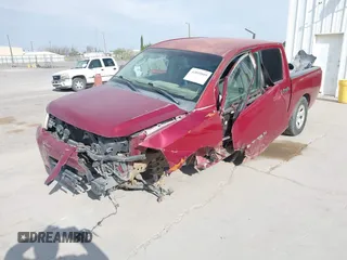 2005 Nissan Titan SE with VIN 1N6AA07A95N514937, listed as a IAAI auction lot 42045809 with 165,556 mi miles. Bid and sale history available at carsss.com. Image 2.