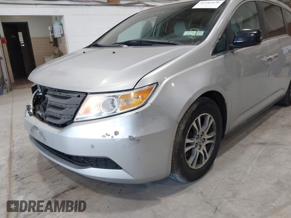 2012 Honda Odyssey EX z VIN 5FNRL5H47CB045705, wystawiony jako IAAI lot #42384430 z przebiegiem 157 598 mil mil oraz . Historia ofert i sprzedaży dostępna na DreamBid. Obrazek 18.