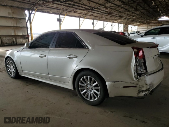 2012 Cadillac CTS with VIN 1G6DA5E52C0131731, listed as a Copart auction lot 59223235 with 104,521 mi miles and Salvage title. Bid and sale history available at DreamBid. Image 2.