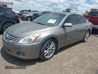 2011 Nissan Altima S with VIN 1N4AL2AP9BN458005, listed as a IAAI auction lot 42235952 with 128,367 mi miles and . Bid and sale history available at carsss.com. Image 2.