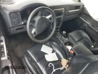 2009 Jeep Commander Sport z VIN 1J8HG48K29C531877, wystawiony jako Copart lot #58708825 z przebiegiem 198 585 mil mil oraz Szkoda całkowita • Salvage title. Historia ofert i sprzedaży dostępna na DreamBid. Obrazek 8.