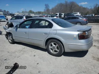 2001 Pontiac Bonneville SE z VIN 1G2HX54K714188652, wystawiony jako Copart lot #49488005 z przebiegiem 157 968 mil mil oraz Tytuł czysty. Historia ofert i sprzedaży dostępna na DreamBid. Obrazek 2.