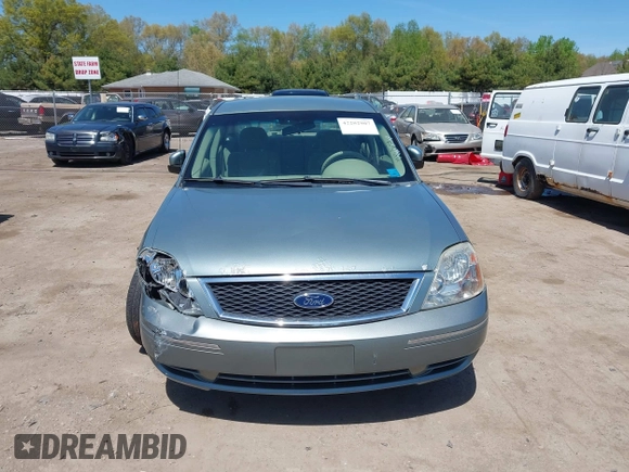 2005 Ford Five Hundred SE z VIN 1FAFP23185G168799, wystawiony jako IAAI lot #42202907 z przebiegiem Nie podano mil oraz . Historia ofert i sprzedaży dostępna na DreamBid. Obrazek 12.