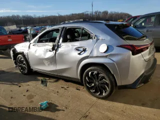 2023 Lexus UX 250h F Sport with VIN JTHB9JBHXP2067404, listed as a Copart auction lot 43605075 with 24,268 mi miles and Salvage title. Bid and sale history available at DreamBid. Image 2.