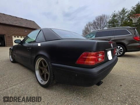1999 Mercedes-Benz SL 500 with VIN WDBFA68FXXF184548, listed as a Copart auction lot 48104955 with 133,450 mi miles and Clean title. Bid and sale history available at DreamBid. Image 3.