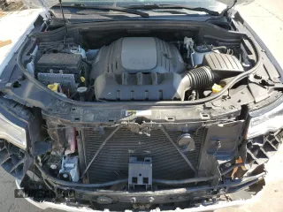 2020 Jeep Grand Cherokee High Altitude с VIN 1C4RJFCT3LC284756, выставлен на аукционе Copart как лот 64639475 с пробегом 58 795 миль миль и Списание • Salvage title. История ставок и продаж доступна на DreamBid. Изображение 12.