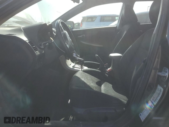 2010 Toyota Corolla with VIN 1NXBU4EEXAZ212290, listed as a Copart auction lot 54184055 with 284,234 mi miles and Salvage Title. Bid and sale history available at DreamBid. Image 7.