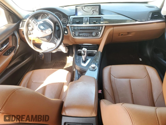2012 BMW 3 Series 328i with VIN WBA3A5C58CF348710, listed as a Copart auction lot 61266815 with 112,720 mi miles and Salvage title. Bid and sale history available at DreamBid. Image 8.