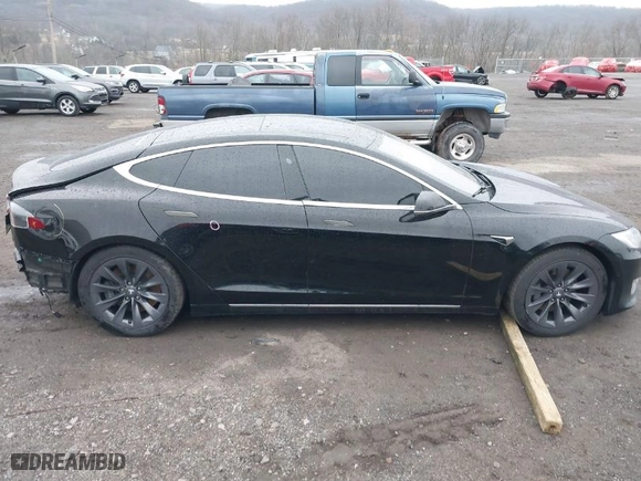 2018 Tesla Model S 75D with VIN 5YJSA1E20JF275490, listed as a IAAI auction lot 41855185 with 253,031 mi miles. Bid and sale history available at carsss.com. Image 13.