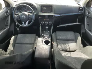 2016 Mazda CX-5 Sport with VIN JM3KE4BY8G0745522, listed as a Copart auction lot 56621825 with 98,757 mi miles and Salvage title. Bid and sale history available at DreamBid. Image 8.