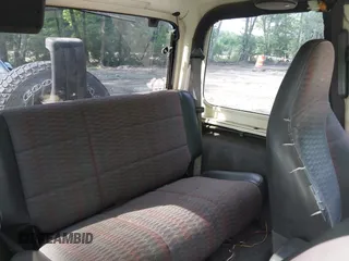 1999 Jeep Wrangler Sport with VIN 1J4FY19S1XP417362, listed as a IAAI auction lot 42738296 with 228,066 mi miles and . Bid and sale history available at DreamBid. Image 8.
