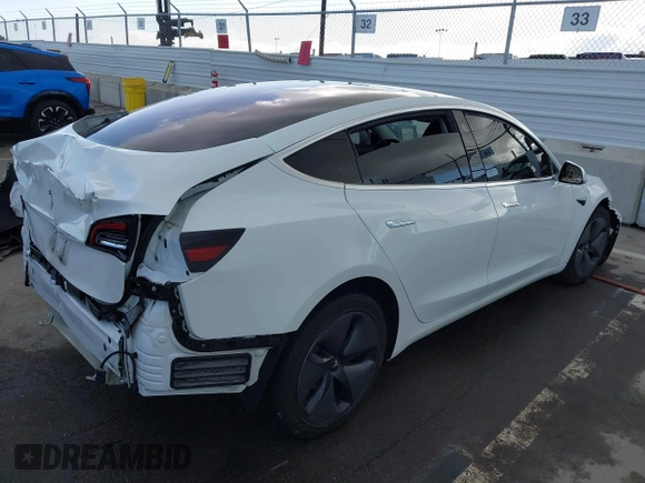 2018 Tesla Model 3 Long Range Battery with VIN 5YJ3E1EA3JF023300, listed as a IAAI auction lot 41925504 with 100,512 mi miles and . Bid and sale history available at DreamBid. Image 4.