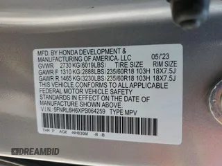 2023 Honda Odyssey EX-L z VIN 5FNRL6H6XPB064259, wystawiony jako Copart lot #58986395 z przebiegiem 22 137 mil mil oraz Szkoda całkowita • Salvage title. Historia ofert i sprzedaży dostępna na DreamBid. Obrazek 13.