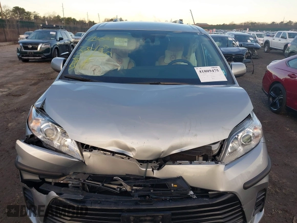 2019 Toyota Sienna LE with VIN 5TDJZ3DC1KS223552, listed as a IAAI auction lot 41809475 with 77,809 mi miles. Bid and sale history available at carsss.com. Image 12.