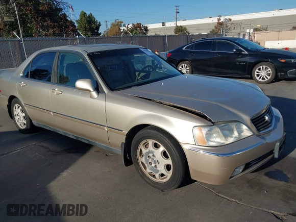 1999 Acura RL with VIN JH4KA9661XC005883, listed as a IAAI auction lot 40560595 with 165,195 mi miles. Bid and sale history available at carsss.com. Image 1.