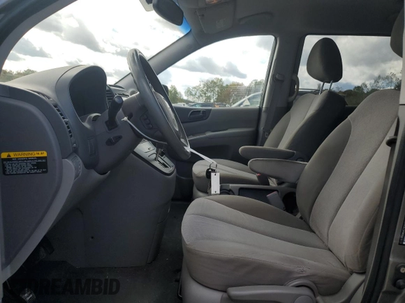 2012 Kia Sedona LX with VIN KNDMG4C7XC6429290, listed as a Copart auction lot 75205014 with 131,359 mi miles and Salvage Title. Bid and sale history available at carsss.com. Image 7.