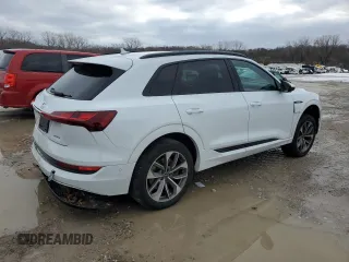 2021 Audi e-tron Premium Plus with VIN WA1LAAGE4MB003487, listed as a Copart auction lot 82790024 with 28,165 mi miles and Salvage title. Bid and sale history available at DreamBid. Image 3.