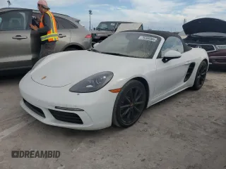 2017 Porsche 718 Boxster z VIN WP0CA2A86HS220141, wystawiony jako Copart lot #76306904 z przebiegiem Nie podano mil oraz Nie do naprawy. Historia ofert i sprzedaży dostępna na DreamBid. Obrazek 1.