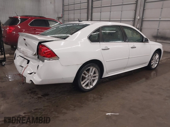 2012 Chevrolet Impala LTZ with VIN 2G1WC5E33C1331027, listed as a IAAI auction lot 42170924 with 211,065 mi miles and . Bid and sale history available at DreamBid. Image 4.