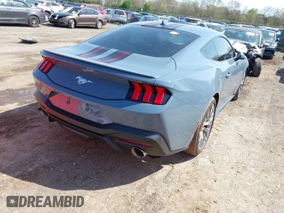 2024 Ford Mustang EcoBoost with VIN 1FA6P8TH1R5135645, listed as a IAAI auction lot 41936457 with 10,871 mi miles. Bid and sale history available at carsss.com. Image 4.