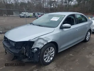 2014 Volkswagen Jetta SE with VIN 3VWD17AJ7EM331139, listed as a IAAI auction lot 41813500 with 110,233 mi miles and . Bid and sale history available at DreamBid. Image 2.