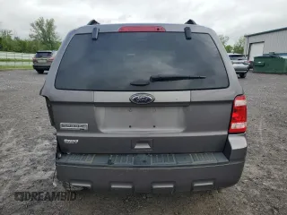 2011 Ford Escape XLT с VIN 1FMCU0D71BKC40590, выставлен на аукционе Copart как лот 58641865 с пробегом 95 211 миль миль и Списание • Salvage title. История ставок и продаж доступна на DreamBid. Изображение 6.