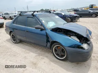 1998 Toyota Corolla VE with VIN 2T1BR18E6WC072503, listed as a Copart auction lot 58751795 with 306,052 mi miles and Salvage title. Bid and sale history available at DreamBid. Image 4.